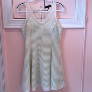 White mesh dress with green underlying fabric